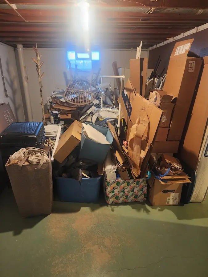 Roll-off dumpster container at job site for Construction Dumpster Rental in Wolf